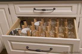 This prevents dust, dirt, or bugs from collecting inside the bowls and tainting the wine. Divine Kitchens Llc Kitchen Drawer Organization Glass Shelves In Bathroom Glass Storage