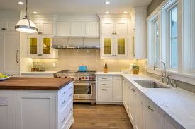 There is an extensive selection of designs, colours and kitchen materials: A Kitchen In Balance Eye Catching Family Friendly Design Riggs Distributing Showroom