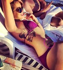 Cara delevingne arm tattoo :: Rita Ora S 25 Tattoos Their Meanings Body Art Guru