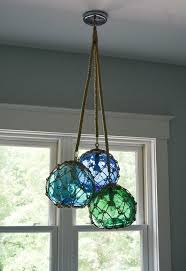 Glass Fishing Float Cluster Pendant Light Etsy Glass Fishing Floats Cluster Pendant Lighting Fishing Floats