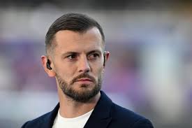 Darts referee hits a triple 20 with a cup of tea in hand: video