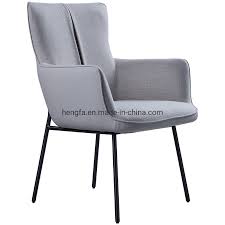 Room & board's modern upholstered dining chairs offer a beautiful dining room look. China Modern Dining Room With Armrests Fabric Grey Leather Upholstered Dining Chairs Photos Pictures Made In China Com
