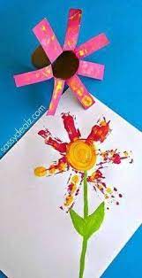 Toilet paper rolls scissors white glue stapler paint + brushes glitter laundry pins. Toilet Paper Roll Flower Paint Stamping Flower Crafts Kids Flower Crafts Spring Crafts