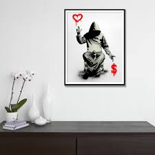 One of the most instantly recognisable artists of our time, the street art produced by the artist known as banksy has captured the imagination of the public. Banksy Store Com Banksy Street Graffiti Canvas Art Boy Love Or Money Wall Art