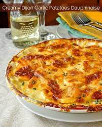 Creamy Dijon Garlic Potatoes Dauphinoise Recipe Potatoes Dauphinoise Potato Side Dishes Garlic Potatoes