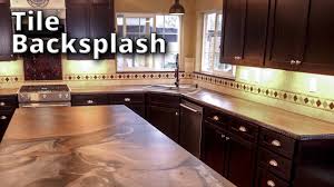 It is important to apply a sealer over a backsplash. How To Tile Backsplash With Epoxy Custom Inserts Stone Coat Epoxy Youtube