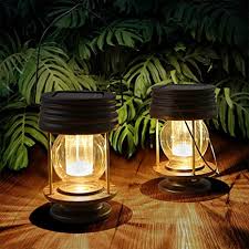 Amazon Com Hanging Solar Lights Outdoor 2 Pack Solar Powered Waterproof Landscape Lanterns With Retro Design For Patio Yard Garden And Pathway Decoration Warm Light Garden Outdoor