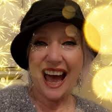 In 1962, Marilyn Monroe wore Jean Louis's custom, crystal-studded “nude”  gown to serenade President Kennedy. Stitched to her body and adorned with  over 2,500 crystals, it became an iconic fashion moment. The