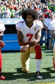 The television broadcast showed isaac, who is black, standing as players and coaches from both teams, as well as referees, took a knee during the playing of the national anthem. Ex Cats Better Understand Message Kaepernick Sent By Kneeling Lexington Herald Leader