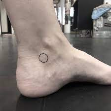 Little Black Circle Tattoo On The Left Inner Ankle Circle Tattoo Ankle Tattoo Designs Black Circle Tattoo