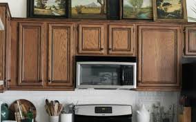 4 Inexpensive Ways To Update A Tired Kitchen Contributed By Zillow Honey N Hydrangea Mdf Cabinets Aging Wood Countertops