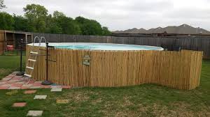 Roll Of Bamboo Wrapped Around Our Pool Small Swimming Pools Above Ground Pool Landscaping Backyard Adventure