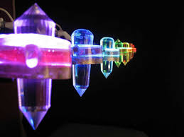 Crystals Suspended Above The Seven Chakras Used As Light Therapy Light Therapy Crystal Light Crystal Holder