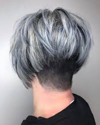 A short cut matched with a statement silver color should be balanced with a soft makeup palette consisting of browns, bronzes, and soft pinks. Edgy Gray Haircuts These Aren T The Gray Hairstyles Your Grandma Wore It S Rosy