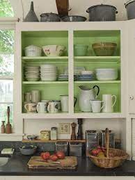 In addition, we prefer the look of shaker style doors. Remove The Cabinet Doors To Create Open Shelving Painting The Cabinet Interior Green Kitchen Cabinets Green Kitchen Kitchen Color Green