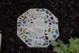 Stepping stones are necessary for being able to move throughout the garden without disrupting the soil, but they also create focal points and structure, and add a little bit of personality! Cute Cement Stepping Stone