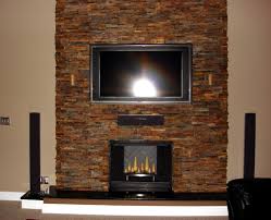 The wall mounted flat screen tv has become a contender for the feature wall of our living room, in place of a fireplace, so how do we decorate the space it occupies? Stone Fireplace Ideas With Tv Inspirations Fireplace Ideas