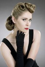 Her curls are swept in an updo which accentuates her neck. 50s Hairstyles For Long Hair A Perfect Mix Of Vintage And Modern