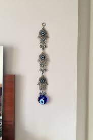 Choose your favorite evil eye designs and purchase them as wall art, home decor, phone cases, tote bags, and more! Evil Eye Home Decor
