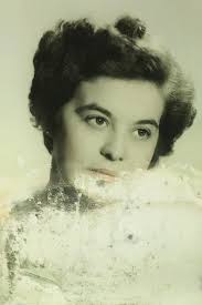 This is an old wedding photo of my mother who passed away in 1994.  Unfortunately there was water damage in storage. Can someone make something  of this please? Thank you so much