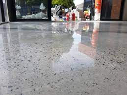 Polished Concrete In Gloss Finish With Random Stone Exposure By Galaxy Concrete Polishing Grindi Polished Concrete Polished Concrete Flooring Concrete Floors