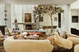 An animal hide rug on a vibrant pink oriental rug adds eclecticism. Nature Inspired Interiors By Clements Design