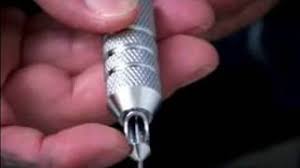 The tattooist'sjob is to guide the course of the needles so they puncture holes in the skin where the design calls for them. Beginning Tattooing Tips How To Insert Needles Into Traditional Tattoo Machine Youtube