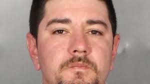 Man arrested after local woman's photo taken in bathroom indicted