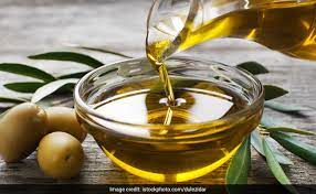 An essential oil, such as olive oil, adds moisture and shine to lackluster hair. Olive Oil For Massage Heres How This Wonder Oil May Benefit Your Hair And Skin Ndtv Food