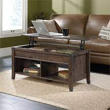 Display decor or books on the lower open shelves. Sauder Carson Forge Lift Top Wood And Metal Coffee Table In Coffee Oak 420421