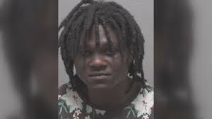 A WPD officer shot a Wilmington man who was armed with a gun