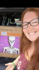 She doesn't want flowers. She wants the 12ft skeleton from Home Depot.