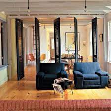 With this tutorial you will be able to create an a. Use Shutters As Room Dividers This Clever Installation From My Home Ideas Has The Shutters Pivot To Living Room Divider Diy Room Divider Living Room Shutters