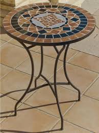 This is a beautiful tile bistro table and two chairs. Hevea Yasir Mosaic Table Indalocio
