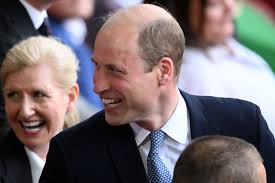 Prince William Laughs at God Save the Cheese Sign at EURO Soccer Game