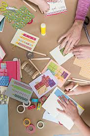 Creating a handmade card is all about making it special for the person you're giving it to. Hands Making Greeting Cards Stockphoto