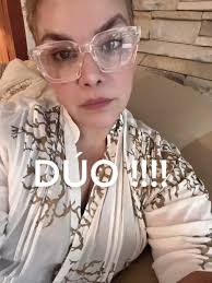 Olga Tañon Singing a Duet with Mariano