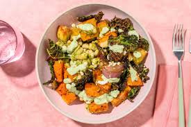 Warm Autumn Butter Bean and Roasted Squash Salad with Zhoug Yoghurt and  Greek Style Cheese