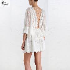 Découvrez cette jolie robe chic pour femme et offrez vous un look moderne et stylé!! Haute Qualite Printemps Manches Longues Blanc Broderie Dentelle Mini Robe Dos Nu Mignon Mini Dentelle Courte Femmes Une Ligne Robe Aliexpress