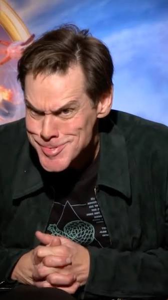 Watch Jim Carrey do his iconic #Grinch face on the spot.