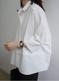 Contemporary Fashion Classic White Shirt Reinvented With Soft Cocoon Silhouette Fashion Minimal Fashion Womens Casual Outfits Leopard print deep v long sleeve blouse. classic white shirt reinvented
