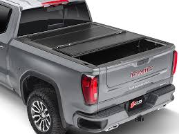 Xcover low profile hard folding truck bed tonneau cover, compatible with 2019 2020 2021 ram 1500 6.4′ standard bed only (not for track system, roll bar well protect your cargos: Hard Folding Tonneau Covers World