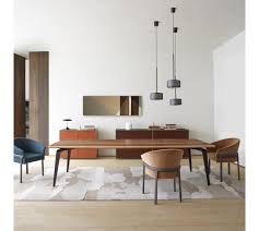 Extendable dining tables come into their own at family gatherings and larger dinner parties. Odessa Tables From Designer Mauro Lipparini Ligne Roset Official Site