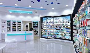 Pin By Lefteris Tsikandilakis Archite On Pharmacy Interior Design Pharmacy Design Pharmacy Decor Grocery Store Design