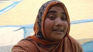 Paddy is being dried in the sun