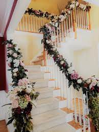 Ton of greenery and seeded eucalyptus + candles. Wedding Day Wedding Decorations Desi Wedding Decor Wedding Staircase Decoration