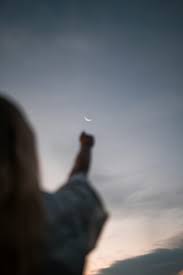 A person reaching for a moon photo – Free Girl Image on Unsplash