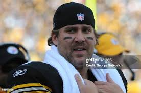 Safety Abram Elam of the Cleveland Browns tackles wide receiver Hines...  News Photo