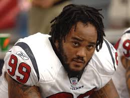 Who were the 23 players drafted before Aaron Rodgers in 2005?