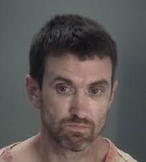 Armed home invasion suspect claims his innocence